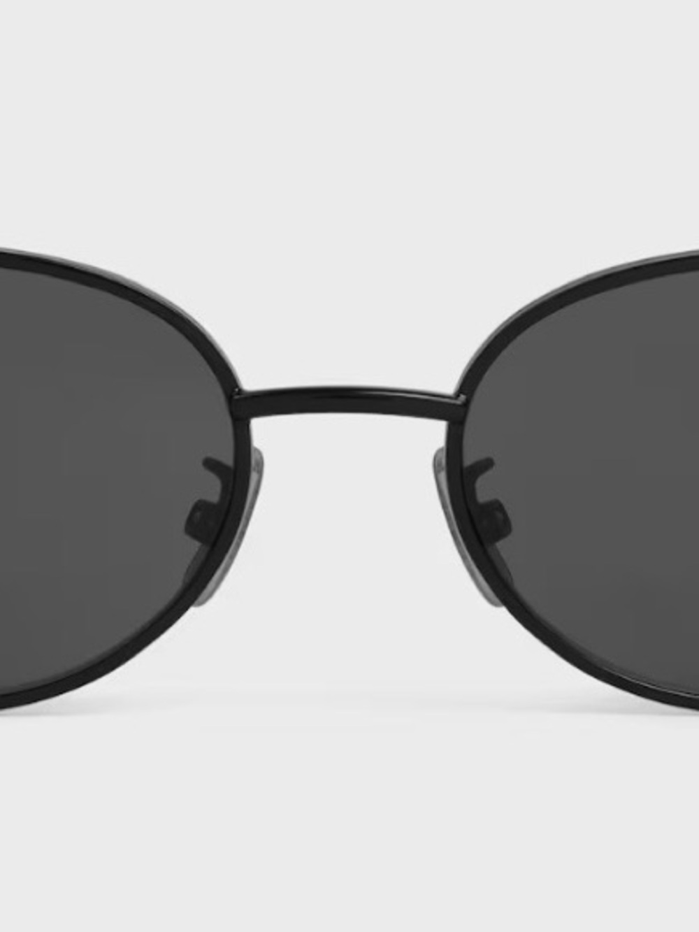 CELINE Triomph metal 01 sunglasses in black/smoke. Comes in tan leather pouch.
